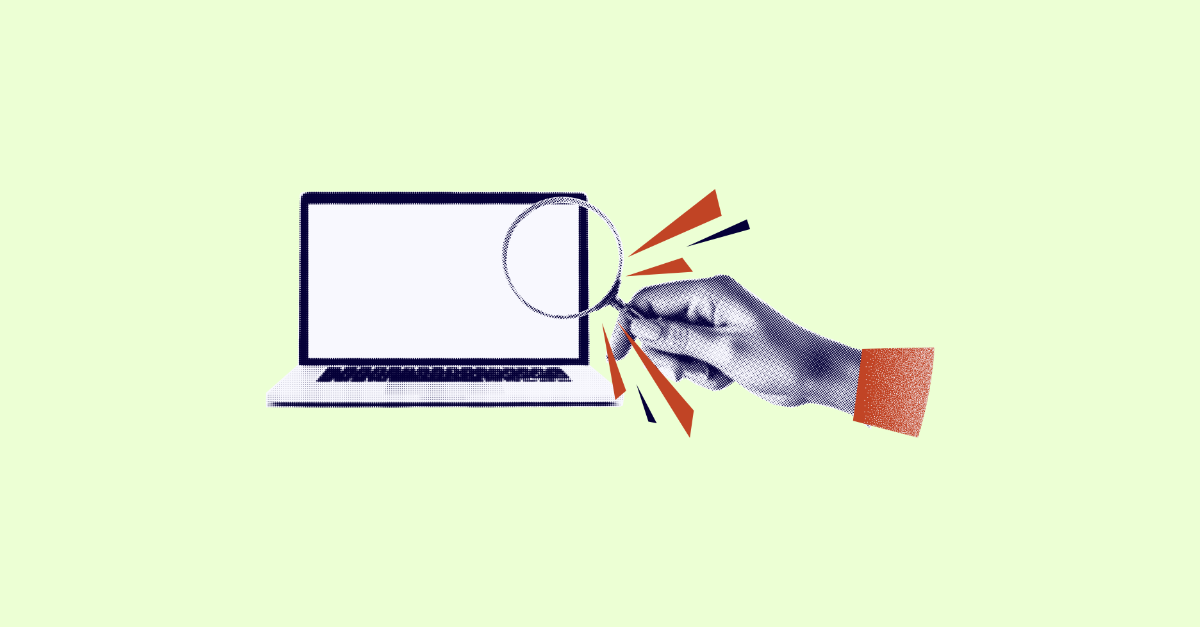 internet search with a laptop and a hand holding a magnifying glass
